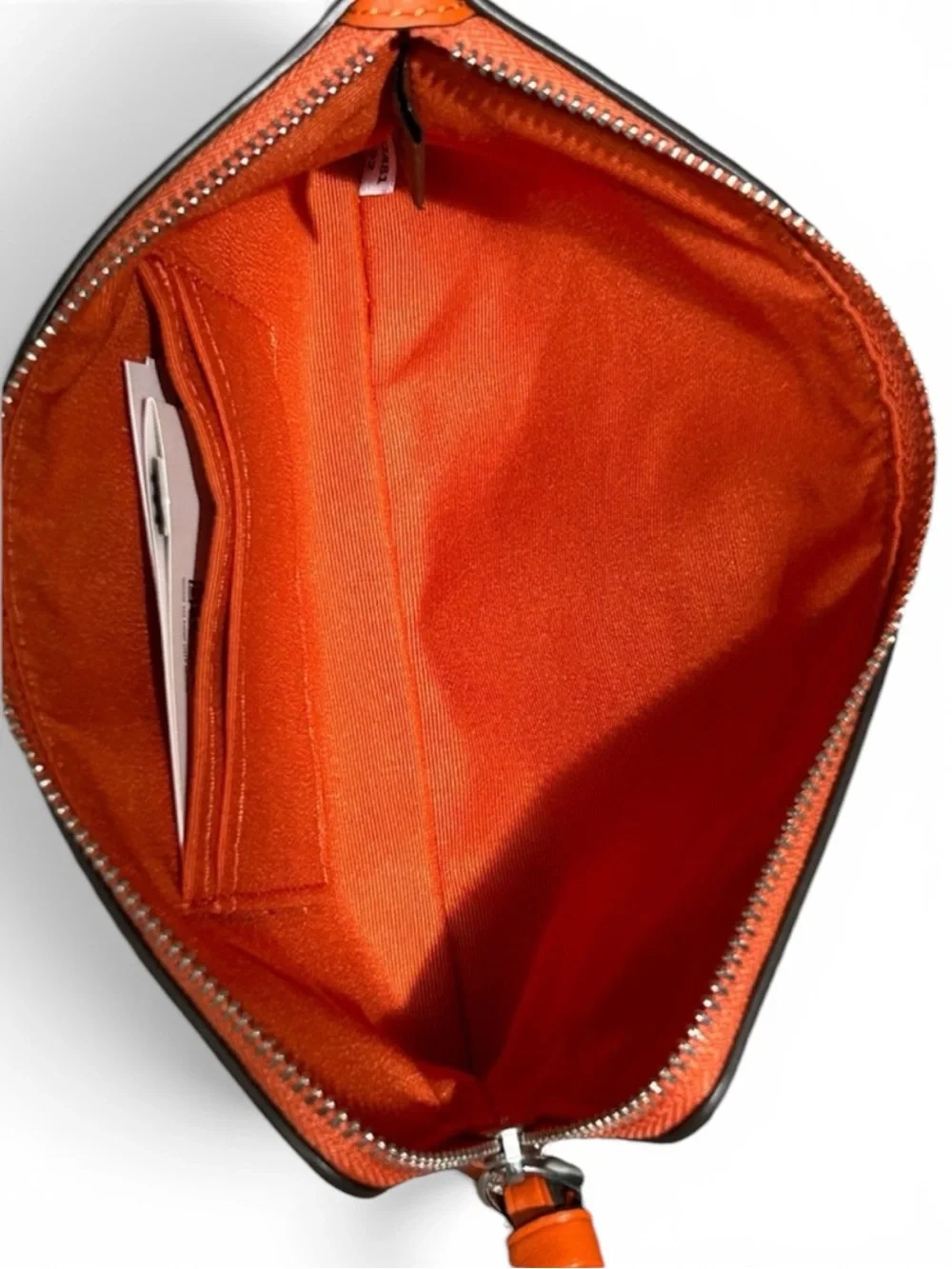 COACH Debossed Sculpted C Smooth Leather Large Corner Zip Wristlet inDark Orange